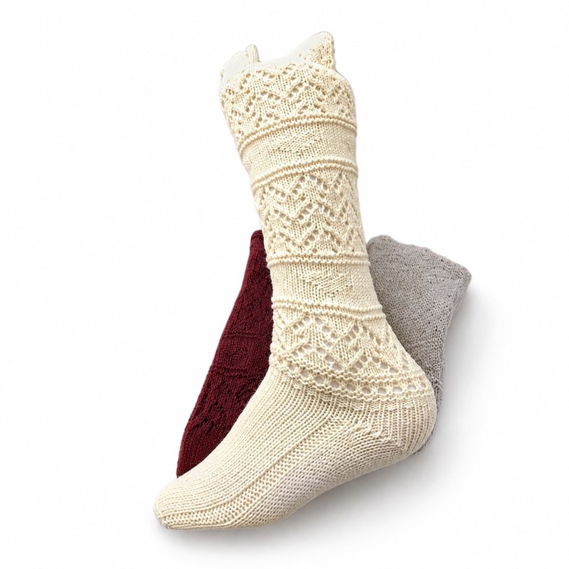 Openwork Lace Socks by ANV Socks — 100% expanded acrylic. Openwork lace-knit mid-calf socks in cream, grey, burgundy, and olive. Delicate hollowed-out pattern creates an elegant lace appearance. Designed for boutique and fashion retail markets.