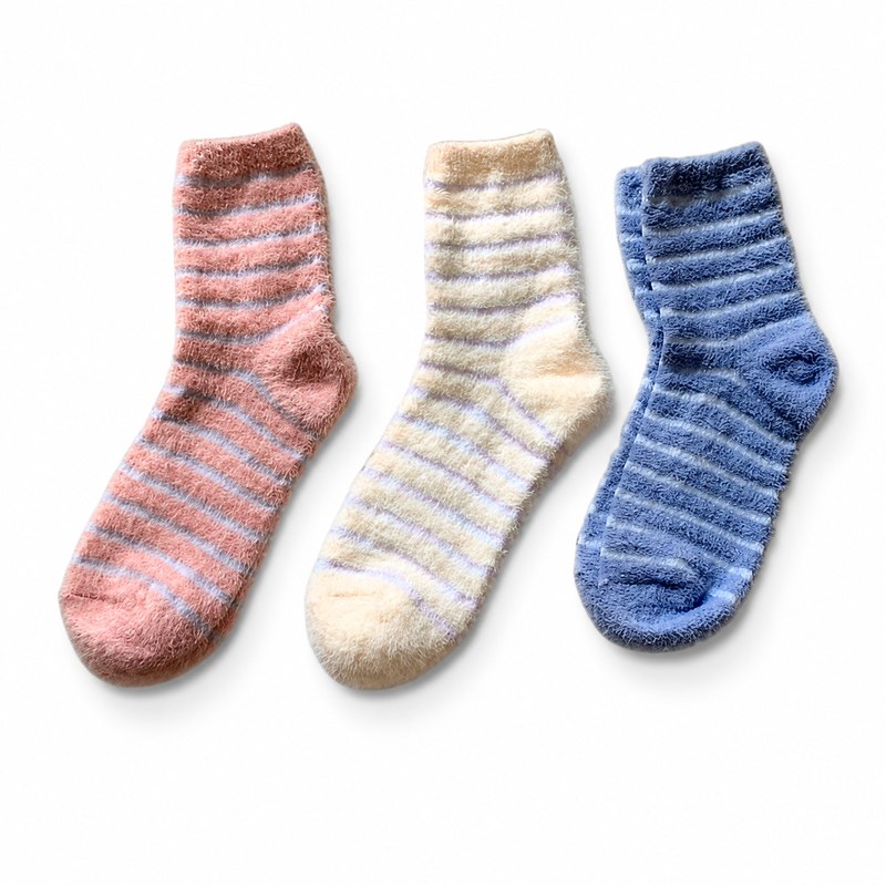 Striped Cozy Socks by ANV Socks — Nylon blend. Soft striped cozy socks in pink, cream, and blue. Fuzzy texture for warmth and comfort. Popular for hotel amenities, winter retail, dollar stores, and gift programs. Individually wrapped packaging available.