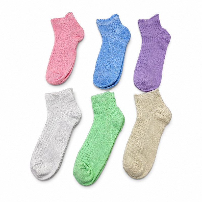 Ruffle Edge Ankle Socks by ANV Socks — 70% cotton, 25% nylon, 5% spandex. Fashion-forward ankle socks with decorative ruffle/lettuce edge cuffs. Available in 6 pastel shades — pink, blue, purple, grey, green, and beige. Popular for women's boutique and fashion retail.