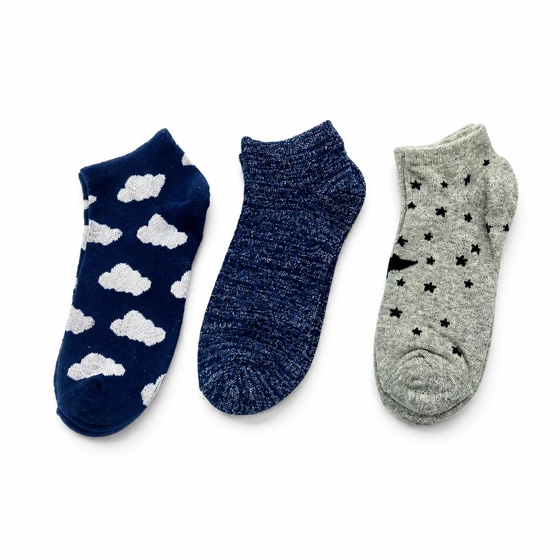Cloud & Star Pattern Socks by ANV Socks — 70% cotton, 23% nylon, 5% spandex, 2% metallic wire. Children's ankle socks with cloud, star, and glitter designs in navy and grey. Metallic wire accent thread adds sparkle. Fun patterns ideal for children's retail and supermarket multi-packs.