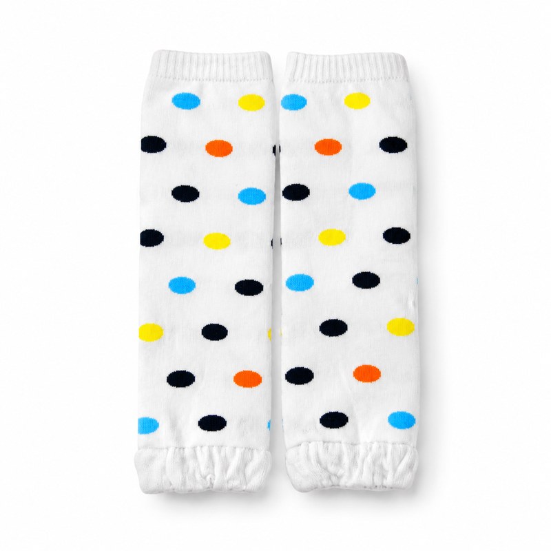 Polka Dot Leg Warmers by ANV Socks — Cotton + lycra. Playful polka-dot leg warmers in beige with colorful dots — blue, yellow, orange, and black. Cotton-lycra blend. One size fits most toddlers and kids. Popular for children's accessories retail.